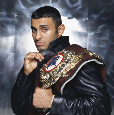 English featherweight boxer Prince Naseem Hamed posing with his WBO featherweight champion belt, circa 1995. (Photo by Terry O'Neill/Getty Images)