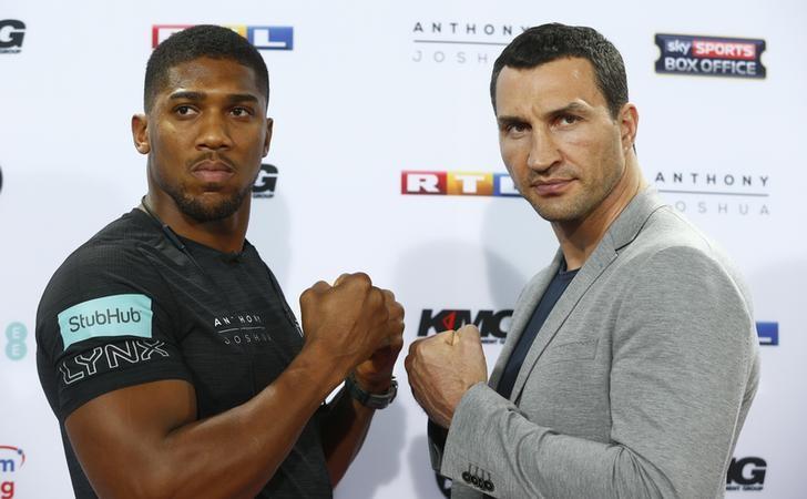 Boxing - Anthony Joshua & Wladimir Klitschko Press Conference - RTL, Cologne, Germany - 16/2/17 Anthony Joshua and Wladimir Klitschko pose during the press conference Reuters / Ralph Orlowski Livepic